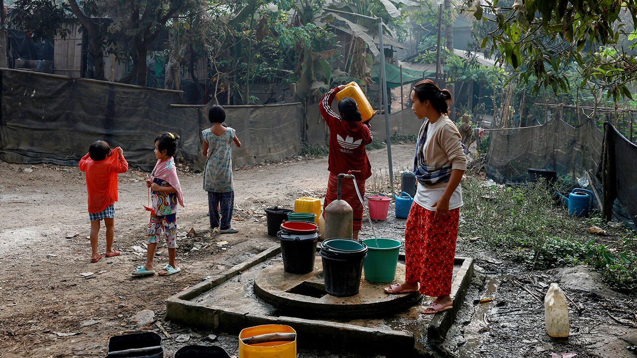 Refugees collect water at Mae La refugee camp in Mae Sot, Thailand, on March 5, 2025