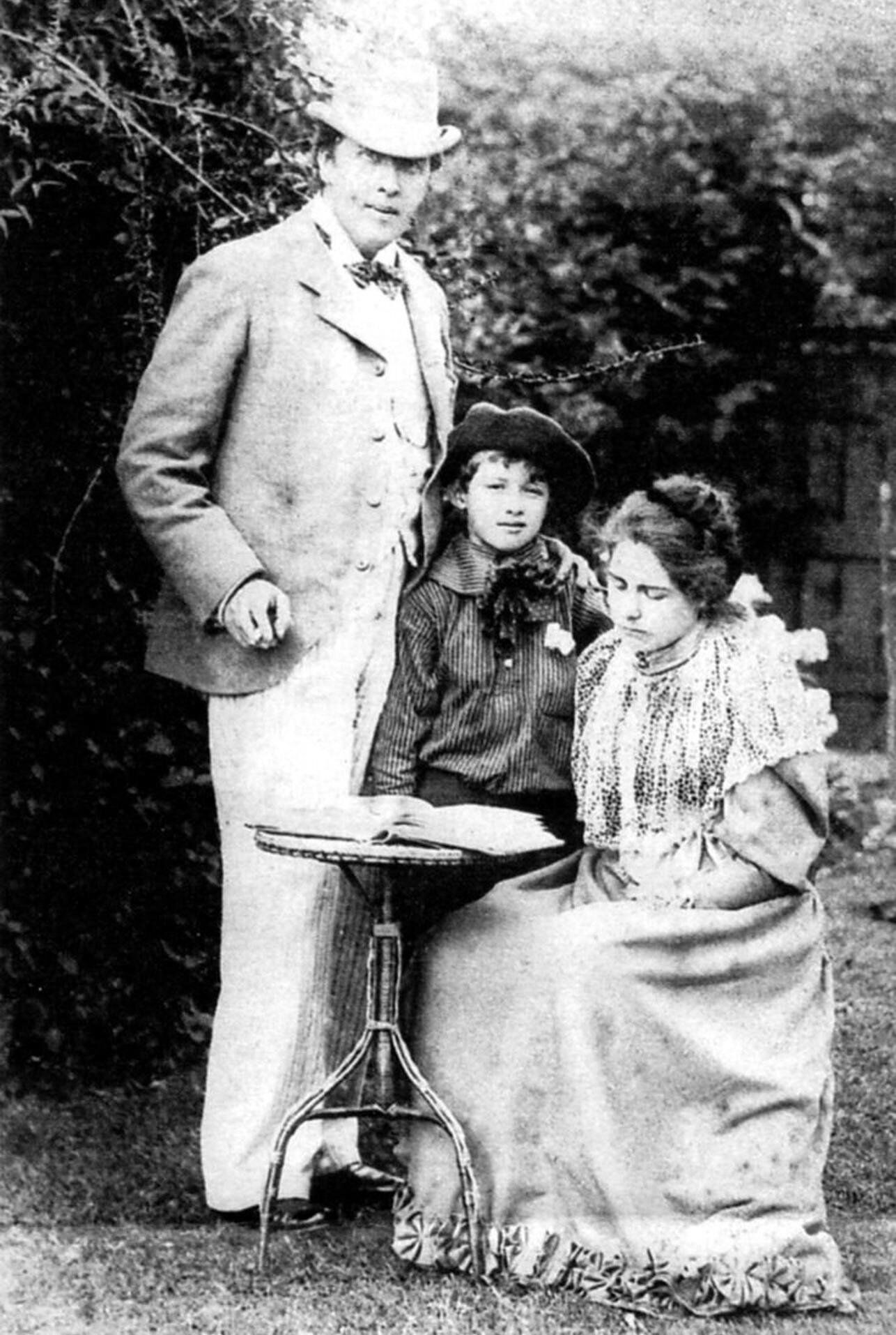 This photograph from 1892 shows Oscar Wilde with his wife, Constance, and their son, Cyril.