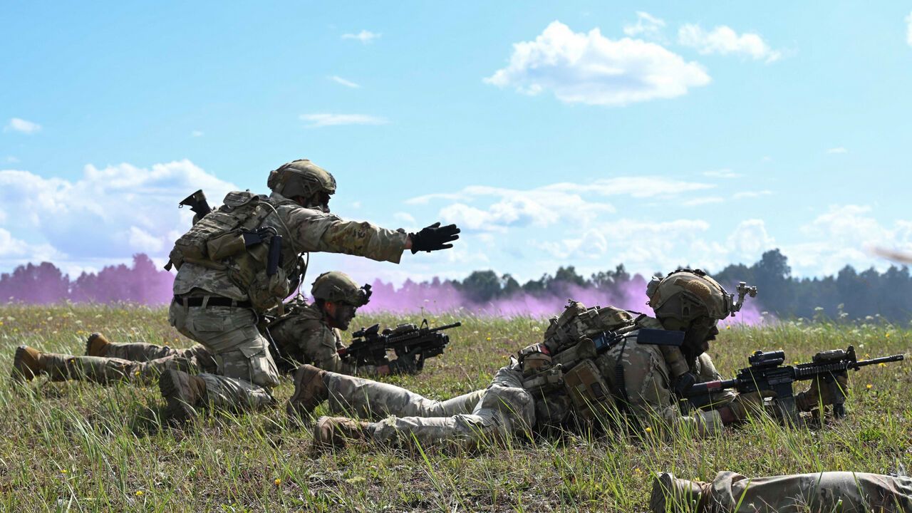  U.S. Soldiers provide suppressive fire during a combined arms live fire exercise in Germany.