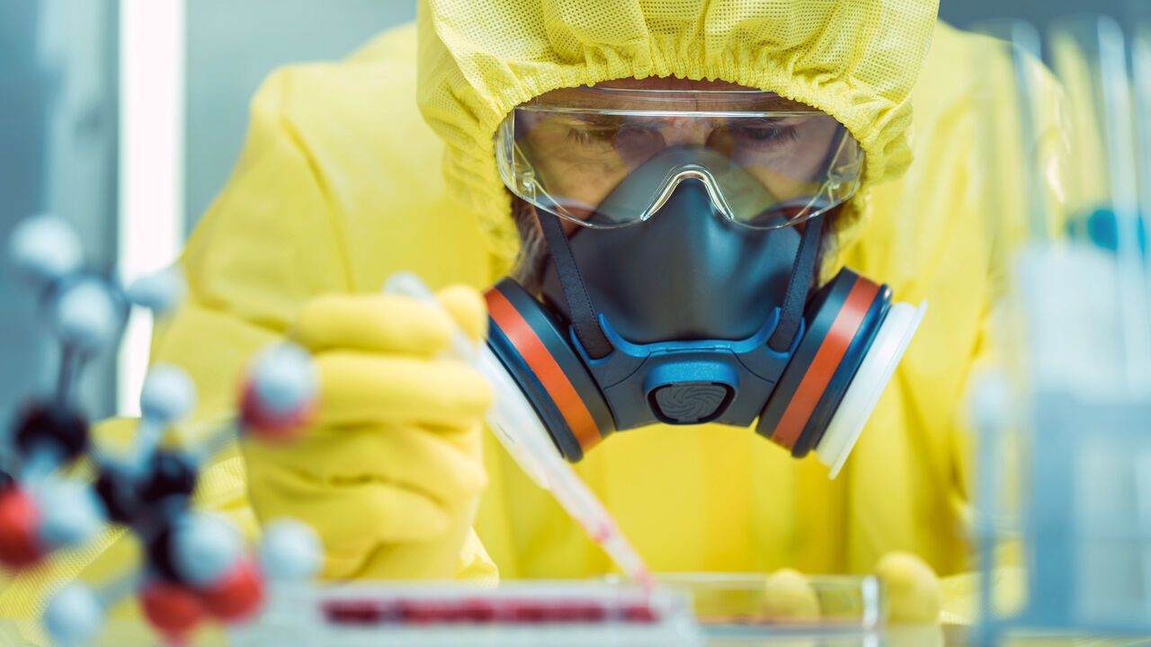Man working with dangerous viruses in a laboratory