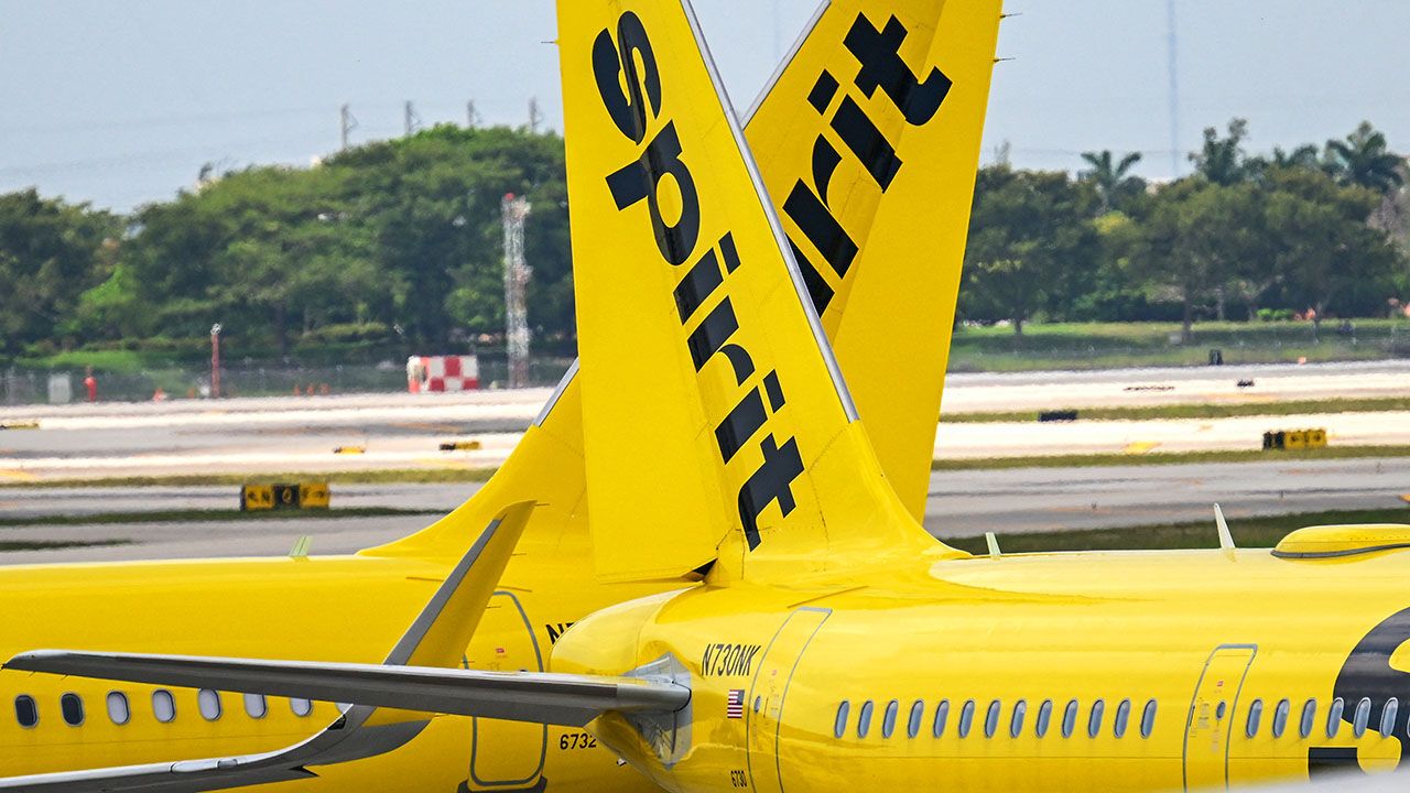 Spirit Airlines jets sat on the tarmac