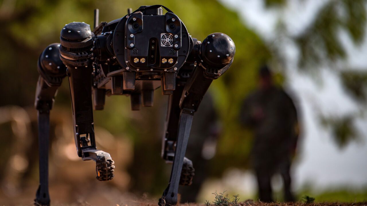 A robot dog runs during initial training exercise at Dyess Air Force Base, Texas.