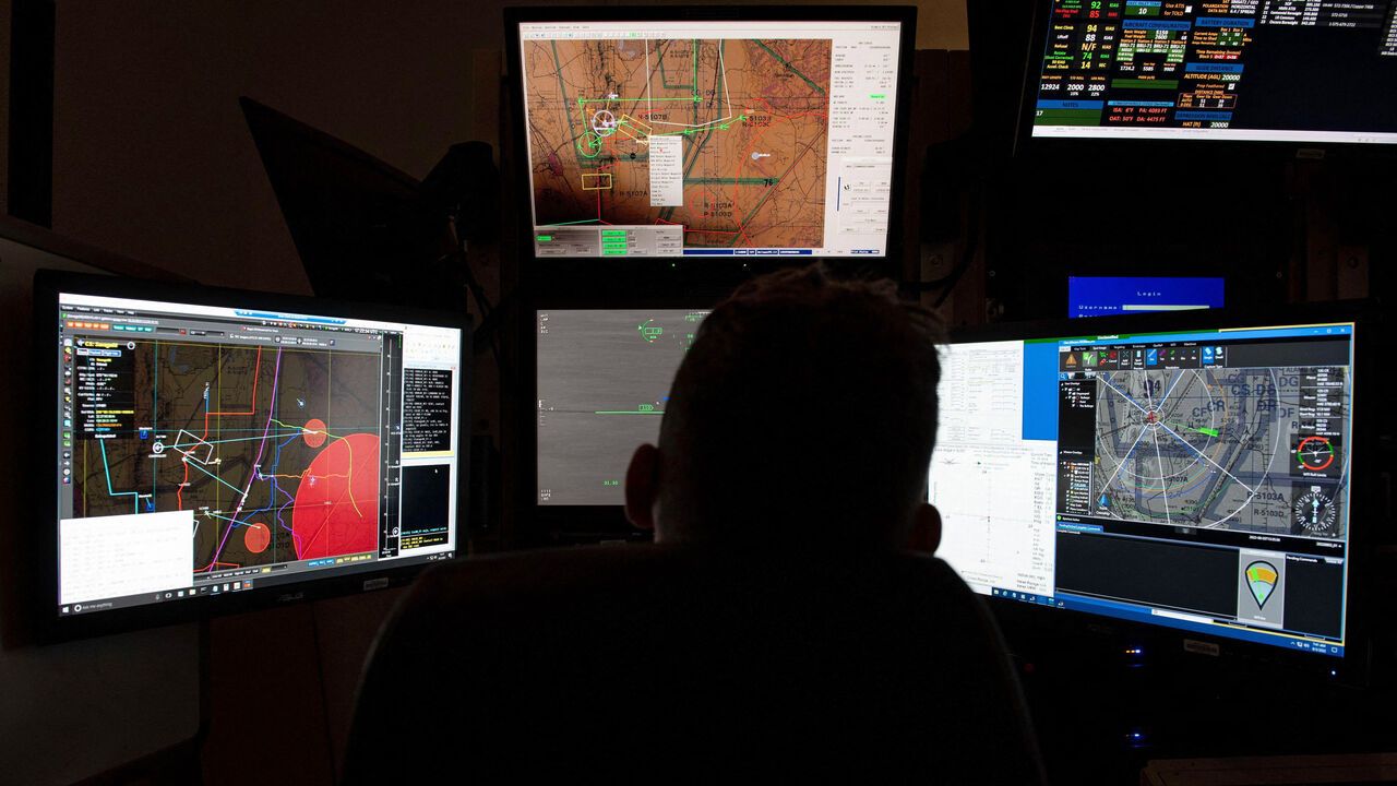  An Airman pilots a simulated MQ-9 Reaper, The simulated version of a ground control station allows students to physically control an MQ-9, camera or weapons system. 