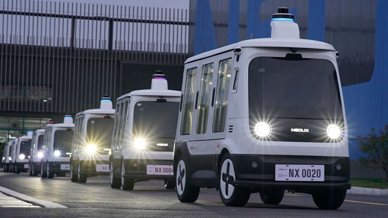Driverless delivery vehicles during a road test at Neolix Technologies Co., Ltd in Beijing, capital of China.