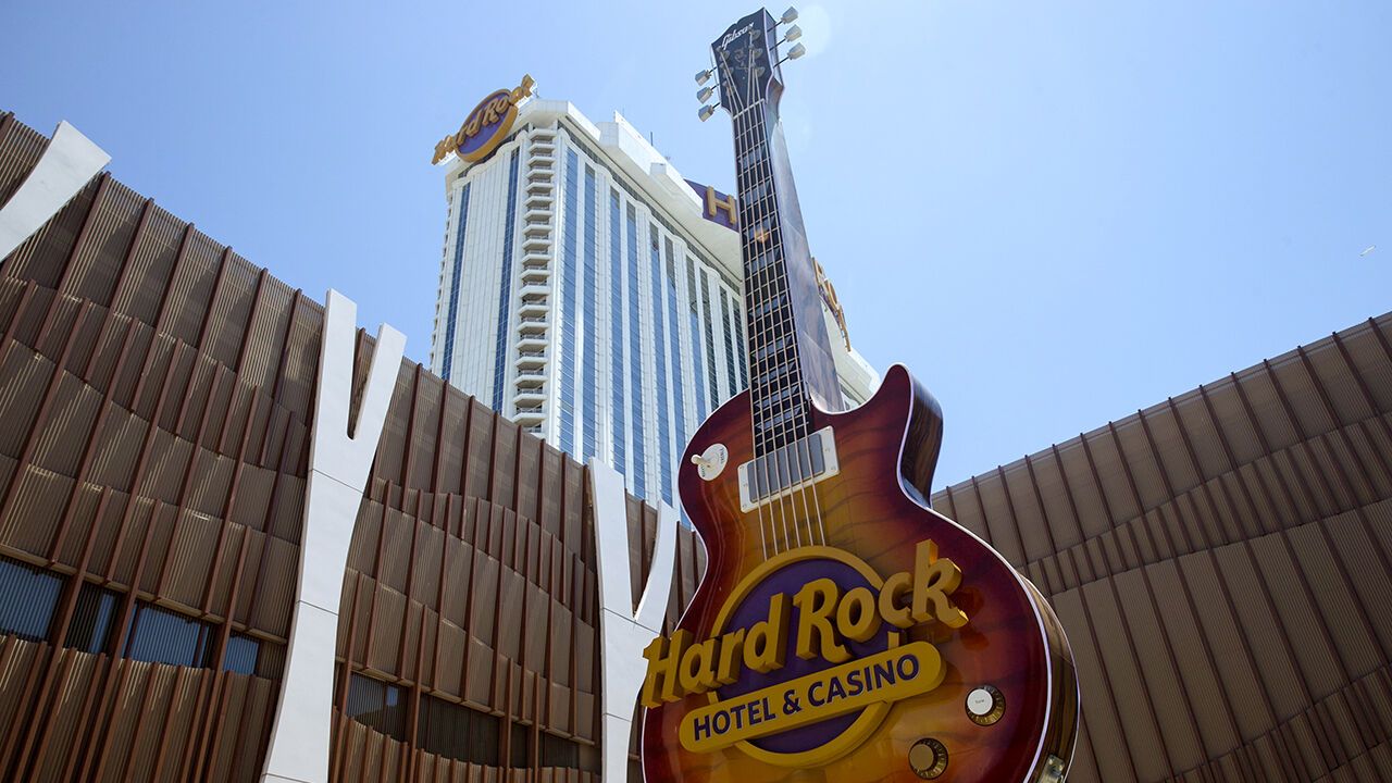 Signage displayed on a guitar stands outside the Hard Rock Hotel and Casino in Atlantic City, New Jersey, U.S., on Thursday, July 2, 2020.