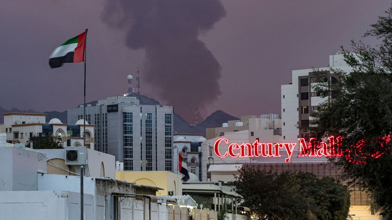 A plume of black smoke rises from the port of Fujairah in the gulf emirate of Fujairah.