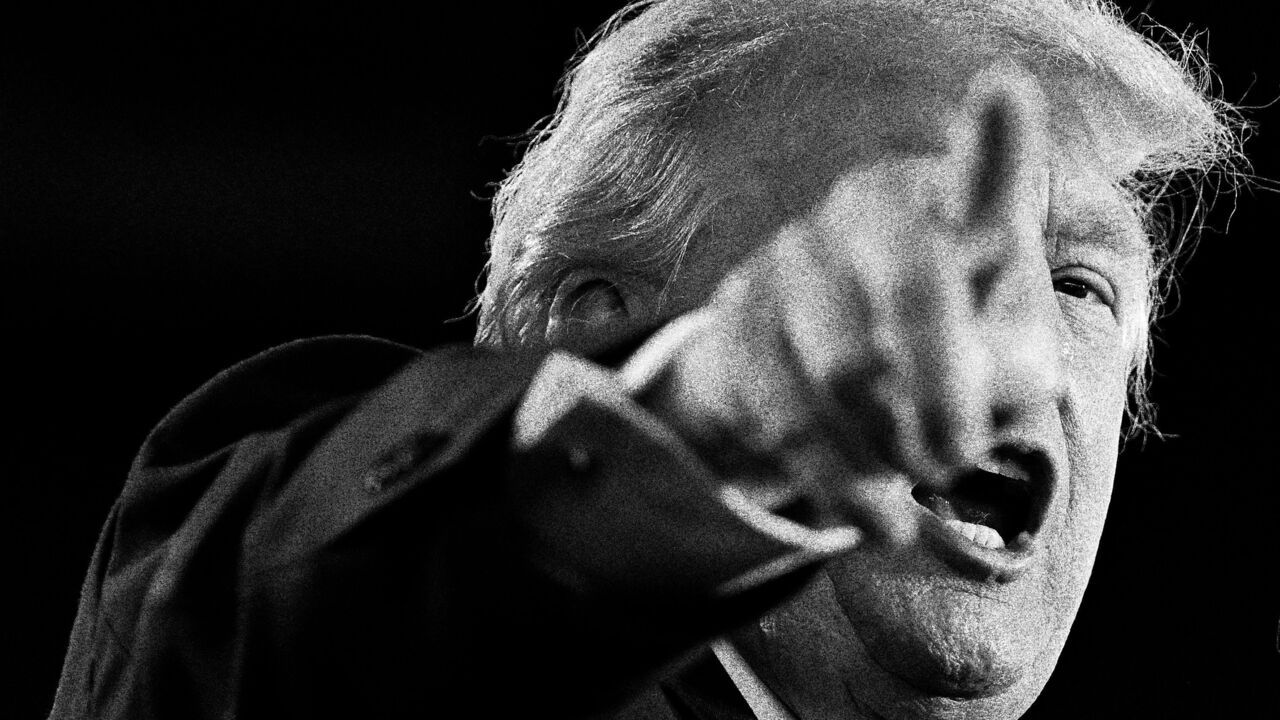 U.S. President Donald Trump points his finger.