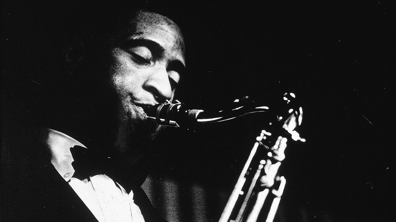 Close-up of Sonny Rollins playing the tenor saxophone, mid 1950s