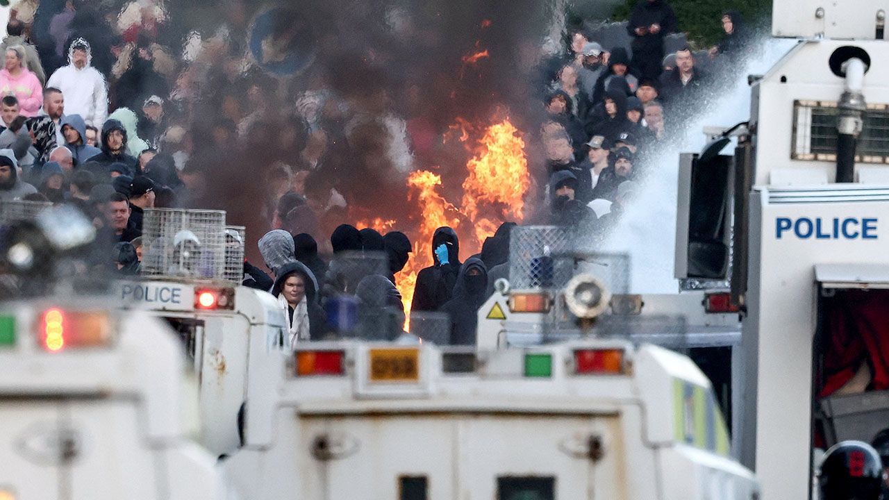 Protesters stand off with police in Glengormley, Belfast