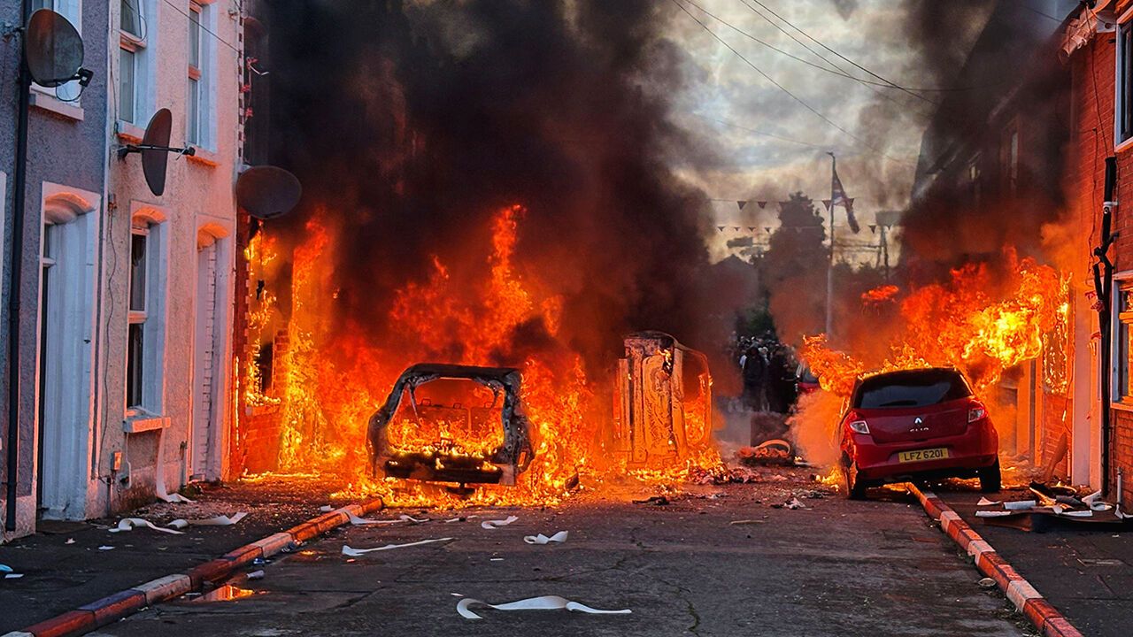 Vehicles set on fire by protesters on Lendrick Street in Belfast, Northern Ireland, June 9th 2026