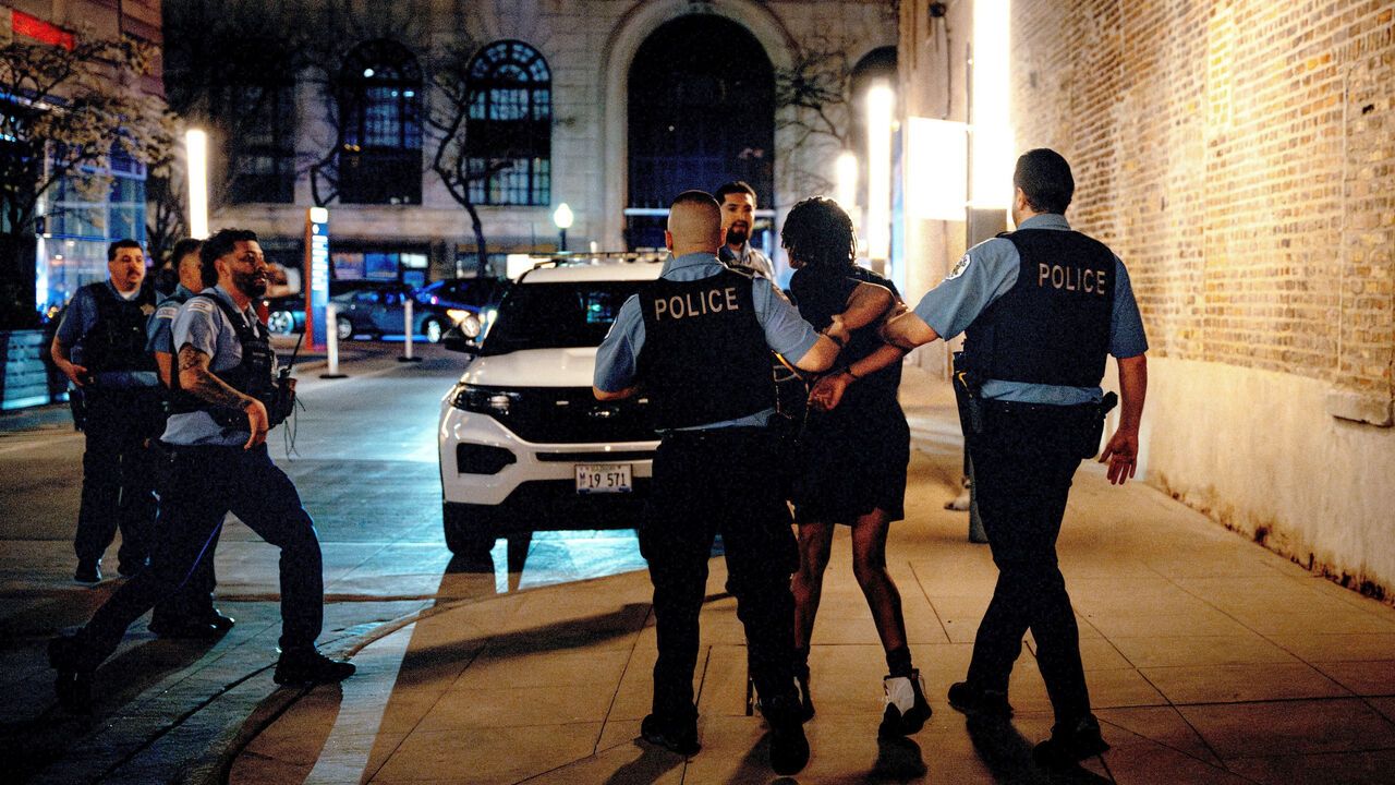 Police officers detained a young person they chased down amid rumors of a "teen takeover" in the Hyde Park neighborhood of Chicago.