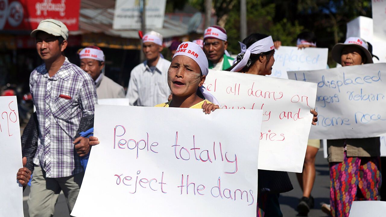 People from Kachin State shout slogan and hold placards during a protest held to show opposition to the Irrawaddy Myitsone Dam project in Myitkyina, Kachin State, Myanmar, 07 February 2019.