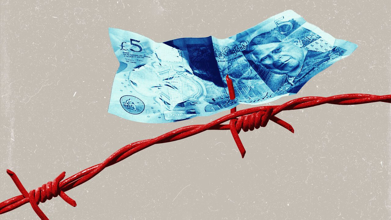 Photomontage of a five pound note stuck in barbed wire.