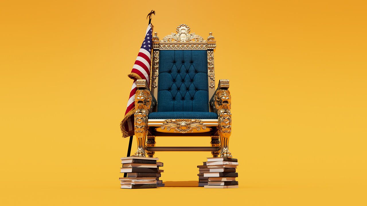A royal blue throne with golden lion armrests stands on stacks of books, with an American flag beside it, against a golden-yellow background