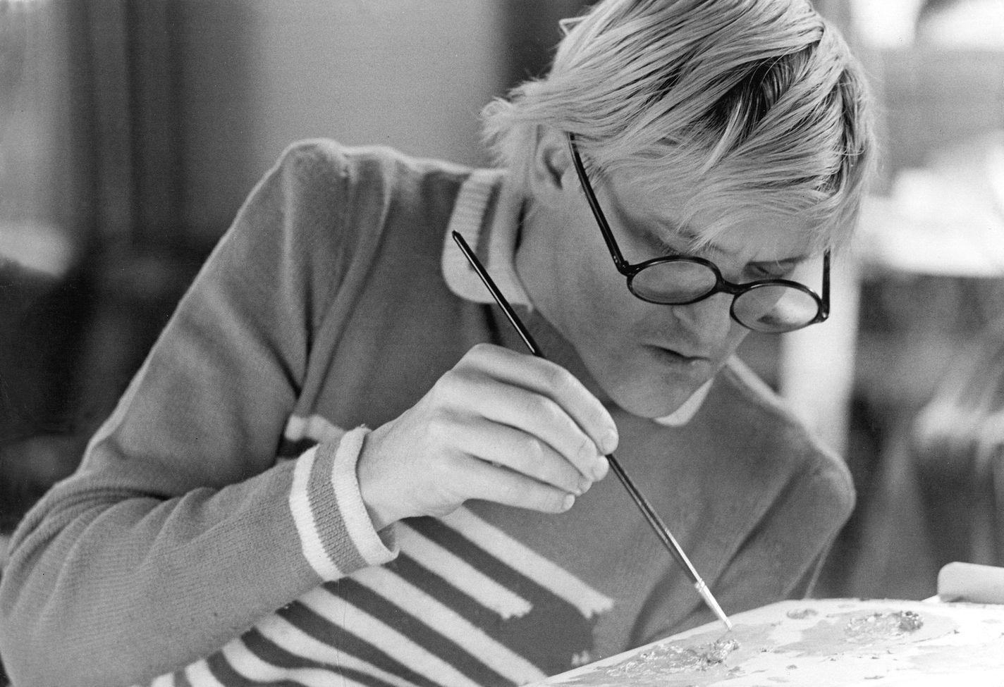 David Hockney painting in 1975