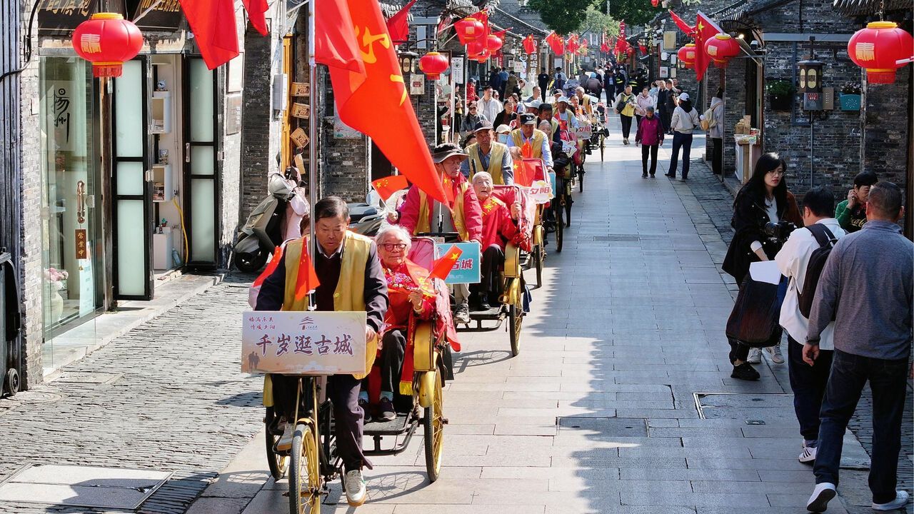 Elderly people visit Dongguan Street