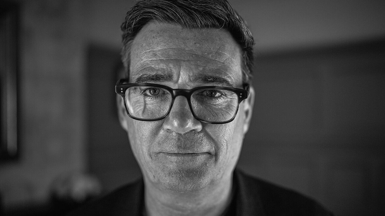 Black and white portrait of Andy Burnham