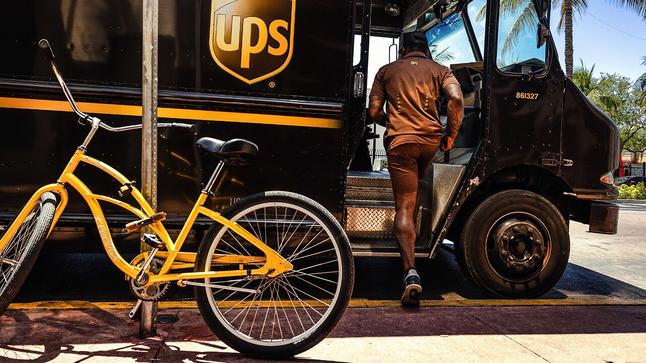 A UPS driver makes deliveries in Miami