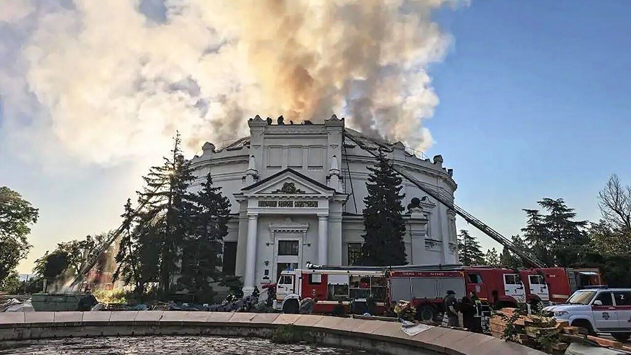 Smoke rises following a Ukrainian drone attack on the Panorama Museum in Crimea