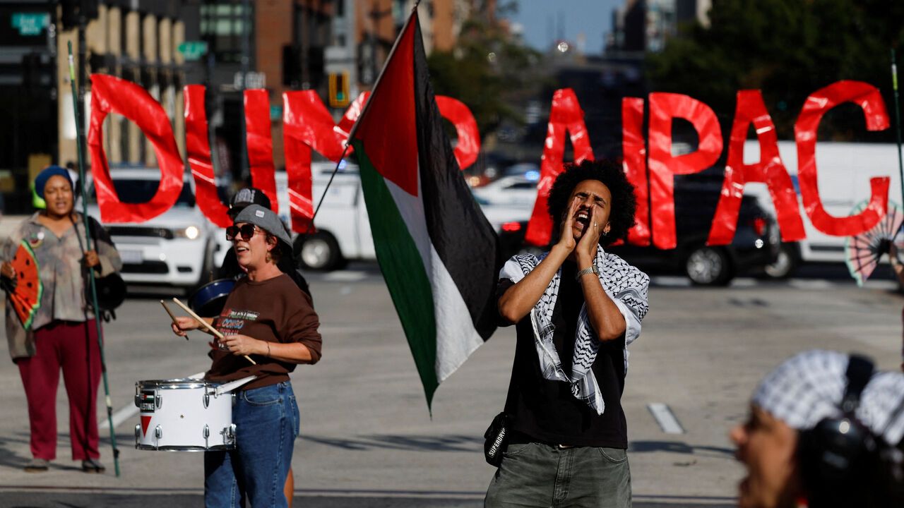 Demonstrators take part in a protest against the U.S. backing of the Israeli military operation in Gaza.