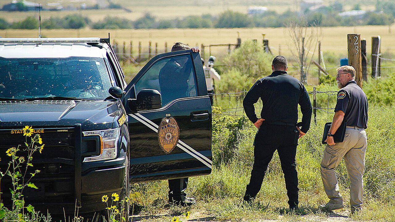 New Mexico State and APD Police Officers and investigate shooting in Moriarty, New Mexico