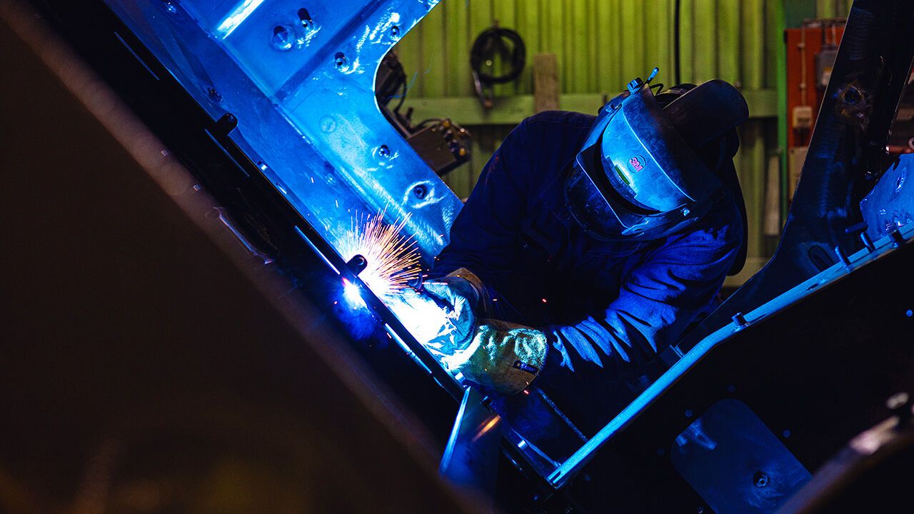 An employee working inside BAE Systems Hagglunds factory.