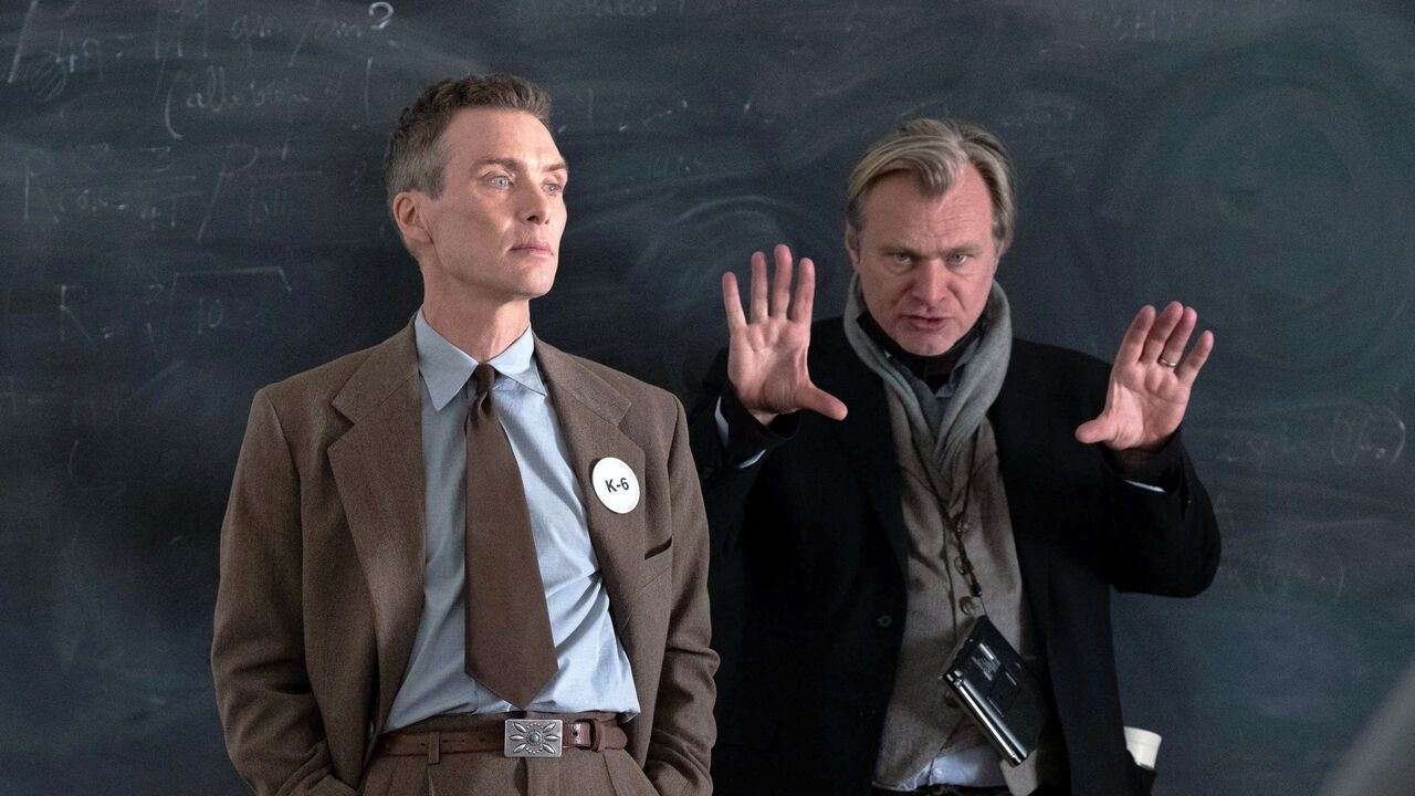 Behind the scenes photo on the set of Oppenheimer, Cillian Murphy as J. Robert Oppenheimer Christopher Nolan Director