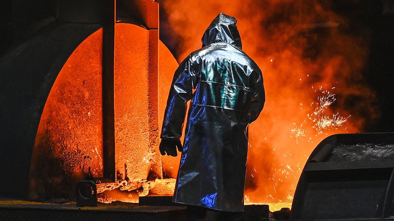 An employee works at the blast furnace at the ThyssenKrupp plant in Duisburg, western Germany