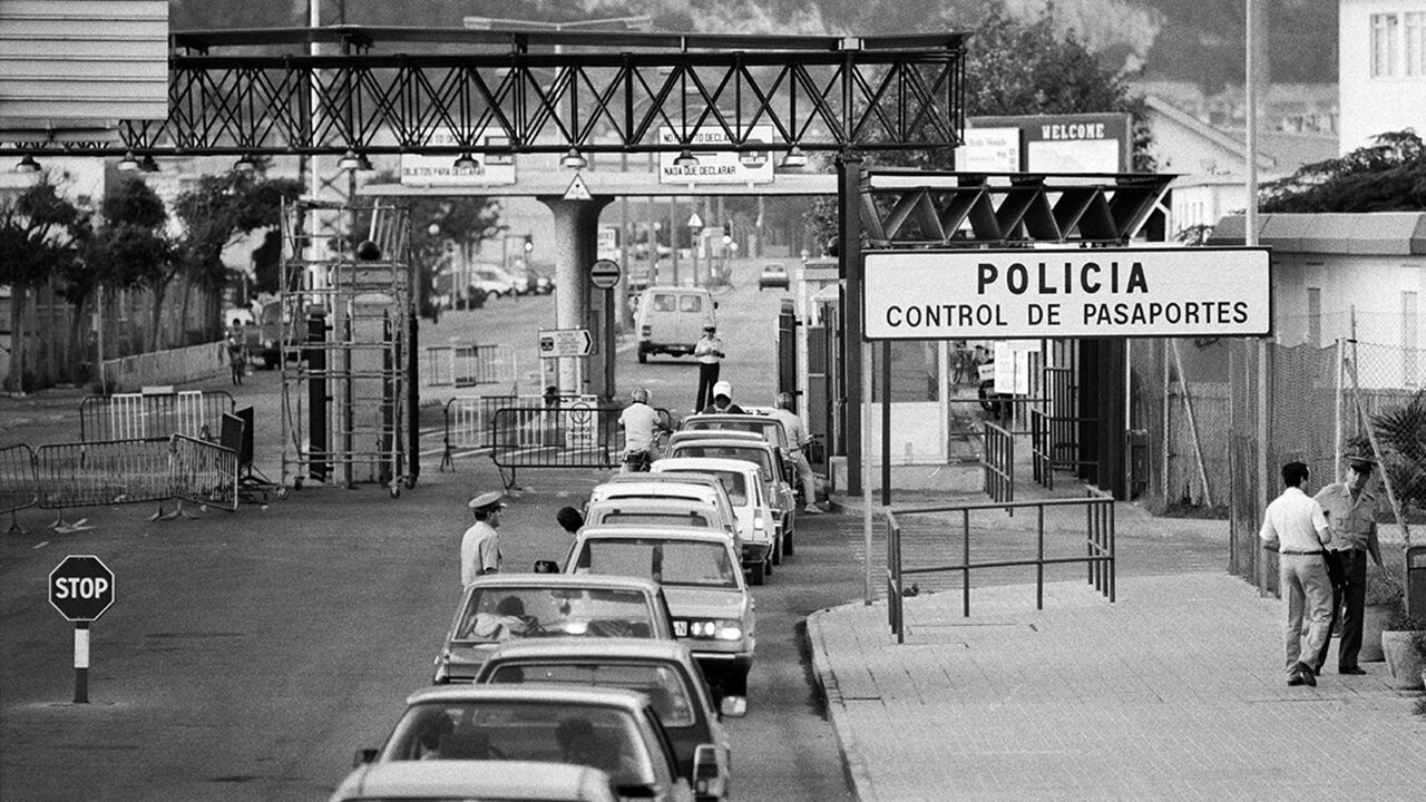 Cars queue and wait to cross the Spanish border crossing into Gibraltar from the Spanish side