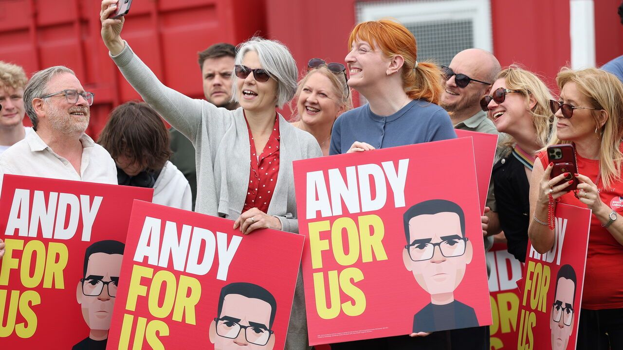 Supporters await the arrival of Manchester Mayor Andy Burnham after his victory in yesterday's Makerfield by-election, at Ashton Town Football Club, on June 19, 2026 in Ashton in Makerfield