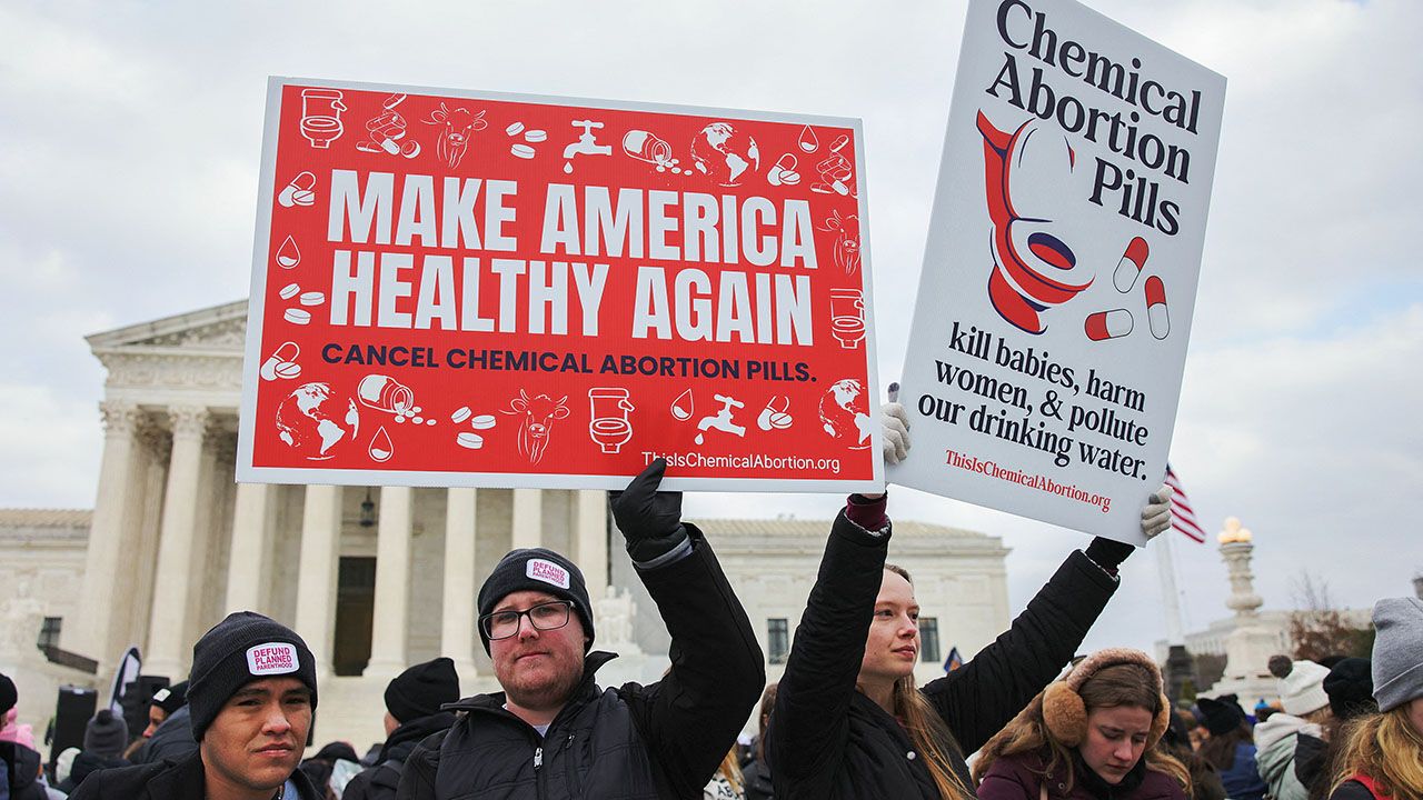 Anti-abortion rights demonstrators march to the Supreme Court.
