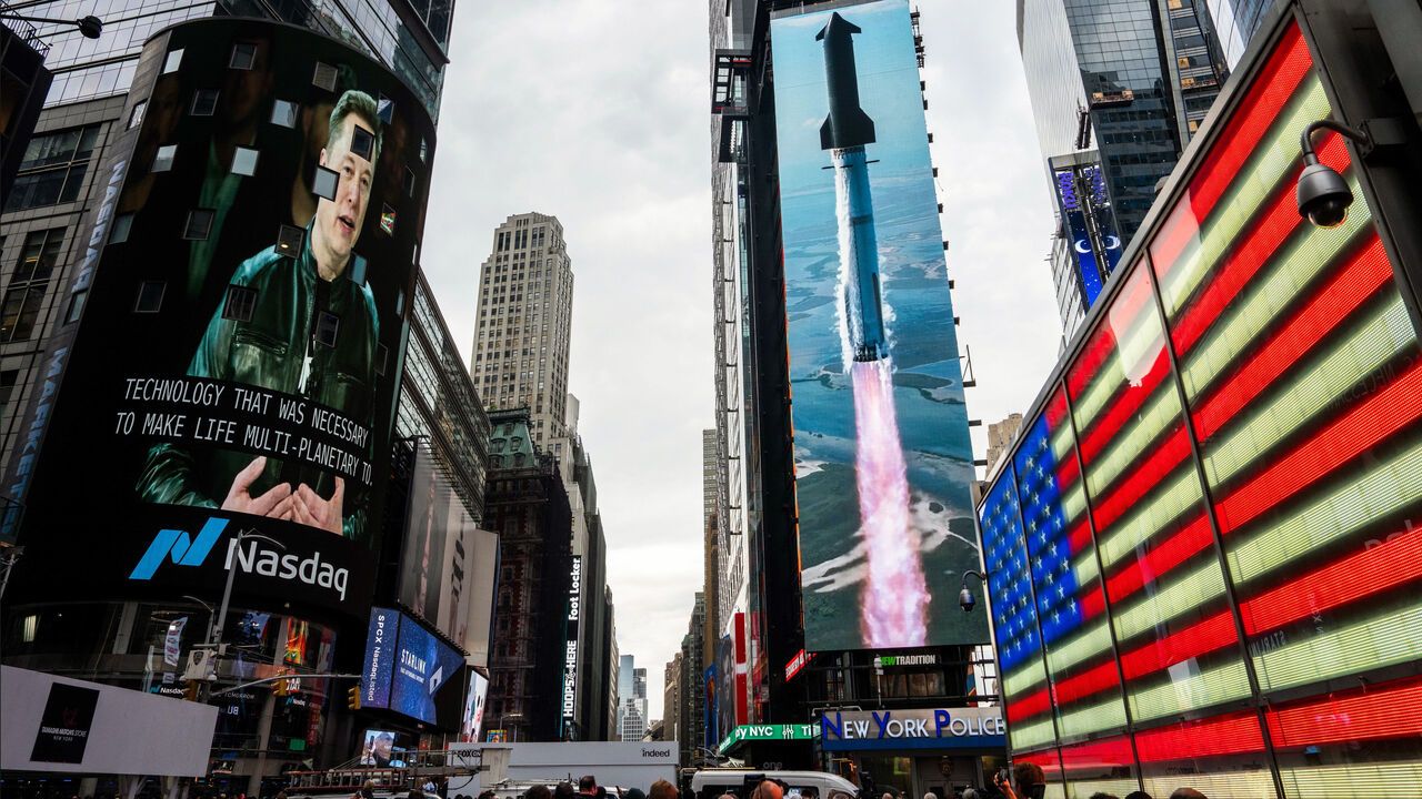 Elon Musk, founder of Space Exploration Technologies Corp. (SpaceX), on screen during the company's initial public offering.