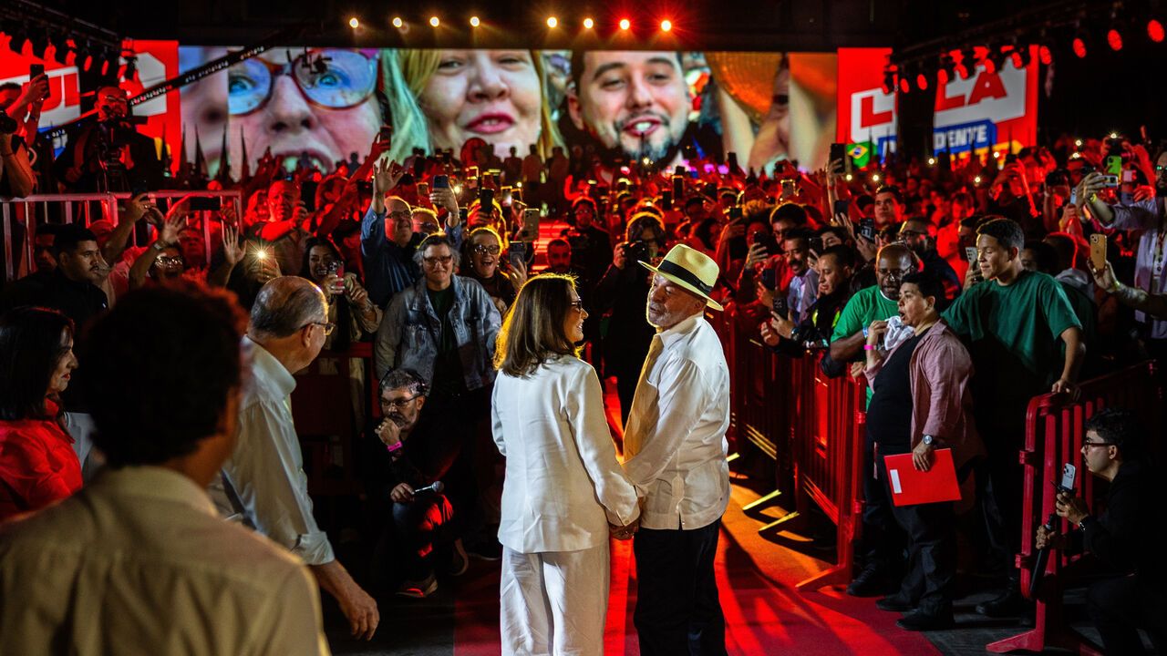 Luiz Inacio Lula da Silva, Brazil's president, center right, with his wife, Janja Lula da Silva, during the Workers' Party (PT) convention in Sao Paulo, Brazil