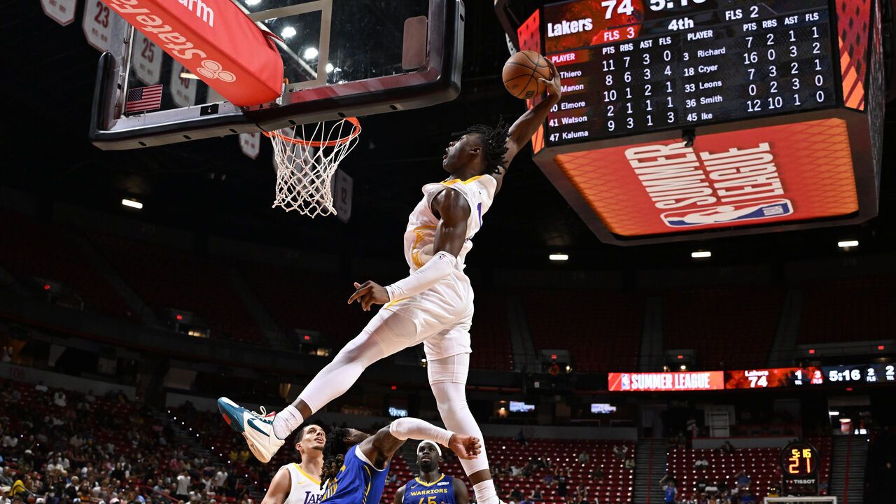 Adou Thiero #1 of the Los Angeles Lakers dunks the ball during the game against the Golden State Warriors.