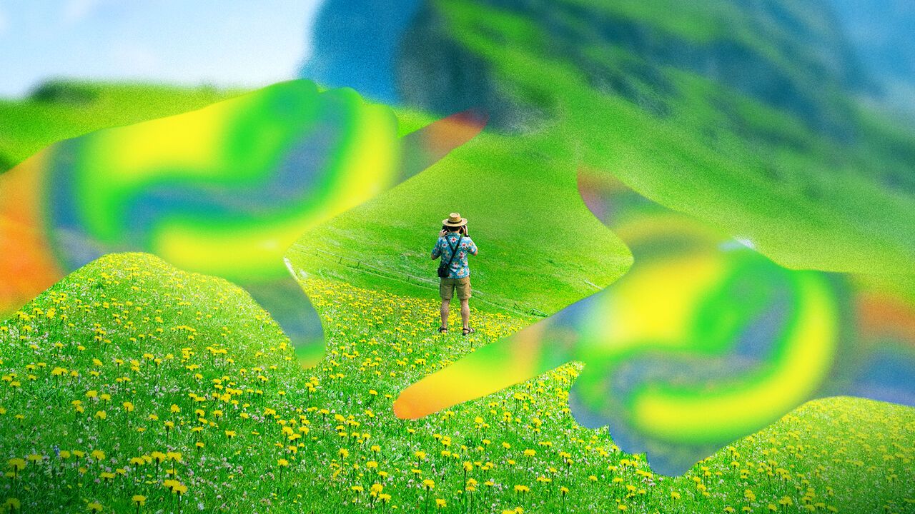 Illustration of a tourist wearing cargo shorts, a patterned shirt and a straw hat standing in a field looking at the landscape ahead and holding a device up. In the foreground two translucent coloured hands can be seen creating a viewfinder shape with the