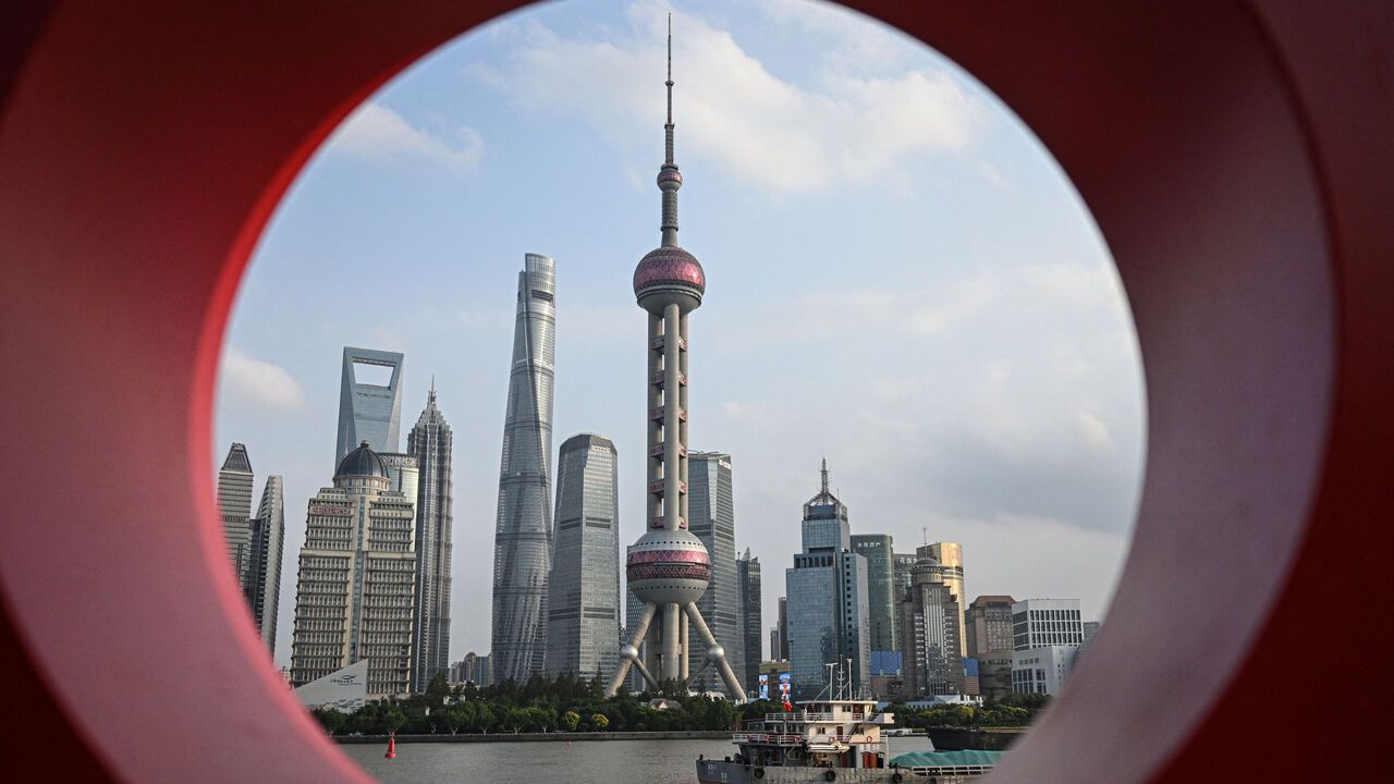 A view of the Lujiazui financial district in Pudong district is seen through an installation (red circle) at the North Bund in Shanghai, China.