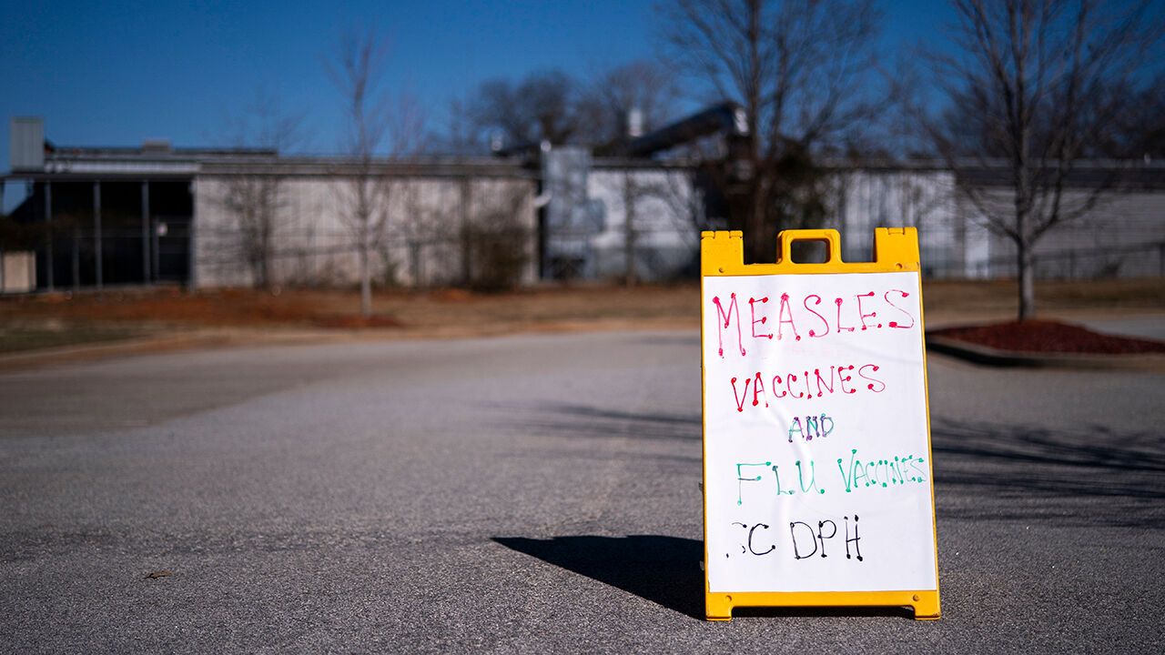 A sign outside a mobile clinic offering measles and flu vaccinations on February 6, 2026 in Spartanburg, South Carolina.