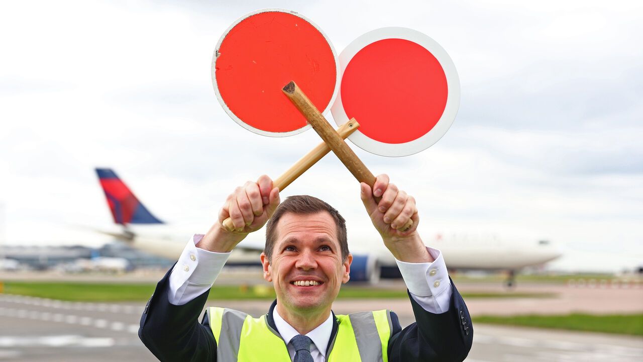 Reform UK MP and Treasury Spokesperson, Robert Jenrick poses airside after a press conference as Reform UK make a policy announcement at Heathrow Airport, London, England.