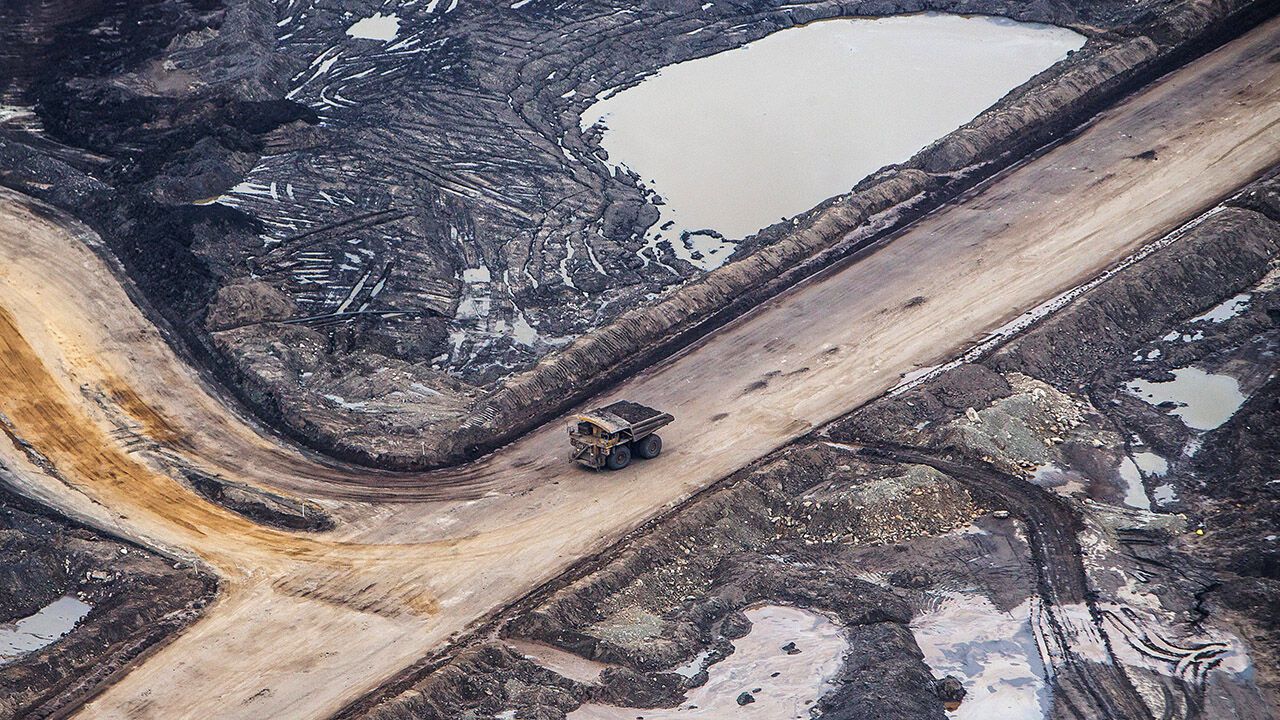A heavy hauler truck drives through the Suncor Energy Inc. Millennium mine.