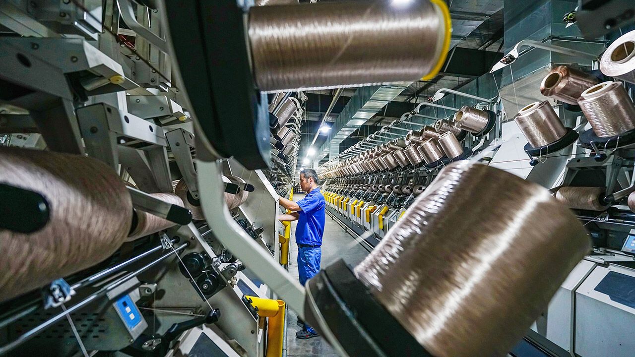 Workers at a chemical fiber company in China.