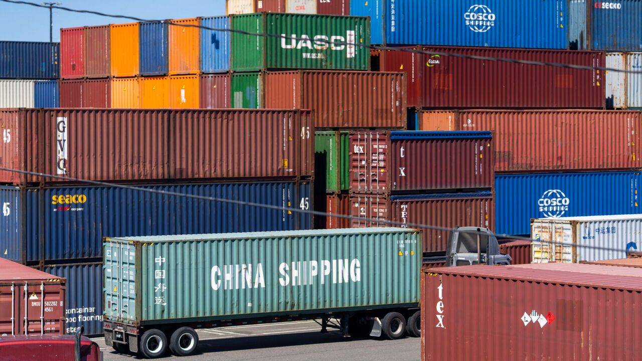 A shipping container labeled ''China Shipping'' is seen on the back of a truck waiting to be unloaded and stacked in the Port of Seattle in Seattle, Washington, USA.