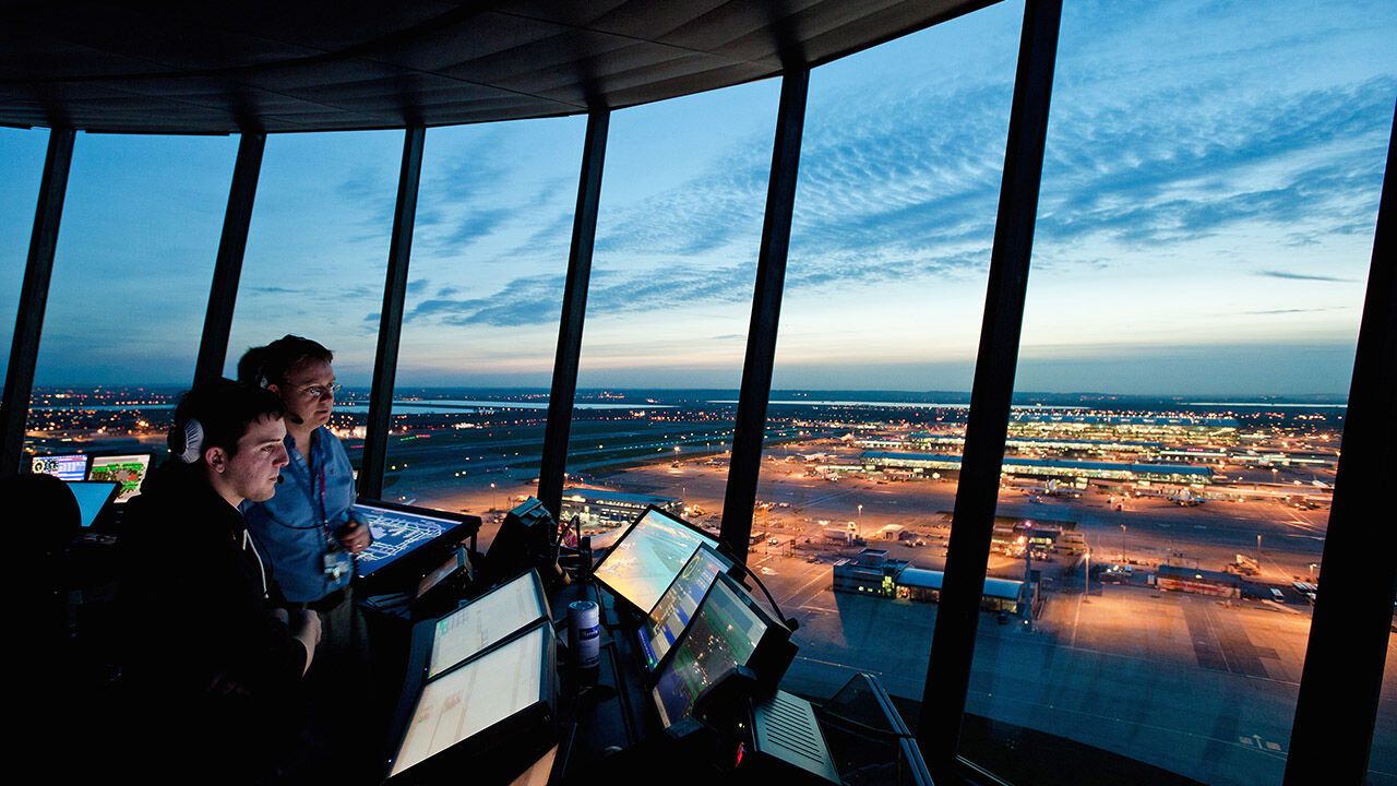 Heathrow control tower at sunset