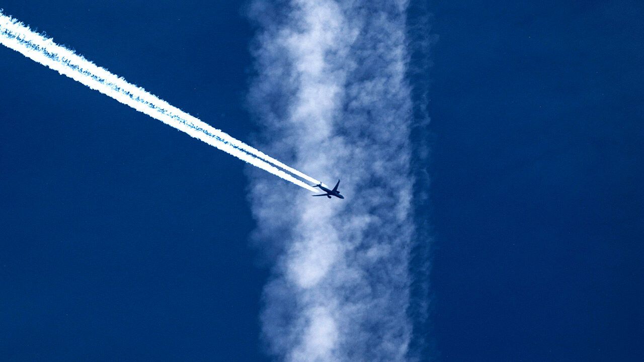 Contrail left by an airplane flying high.