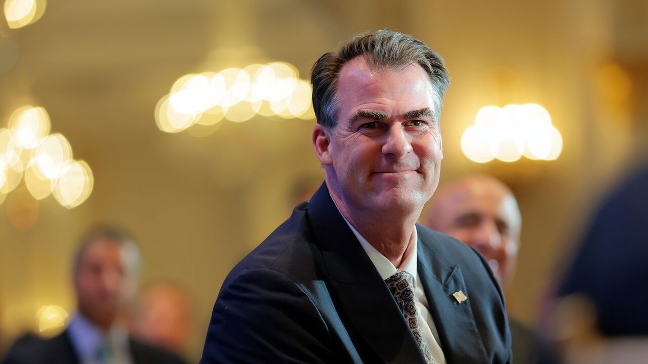 Kevin Stitt smiling.
