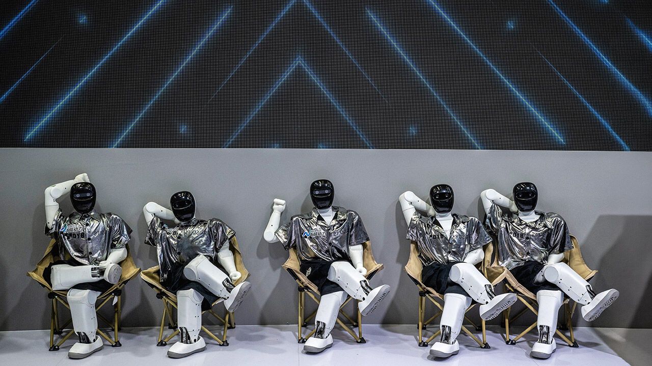 Humanoid robots seated in a row in Beijing, China