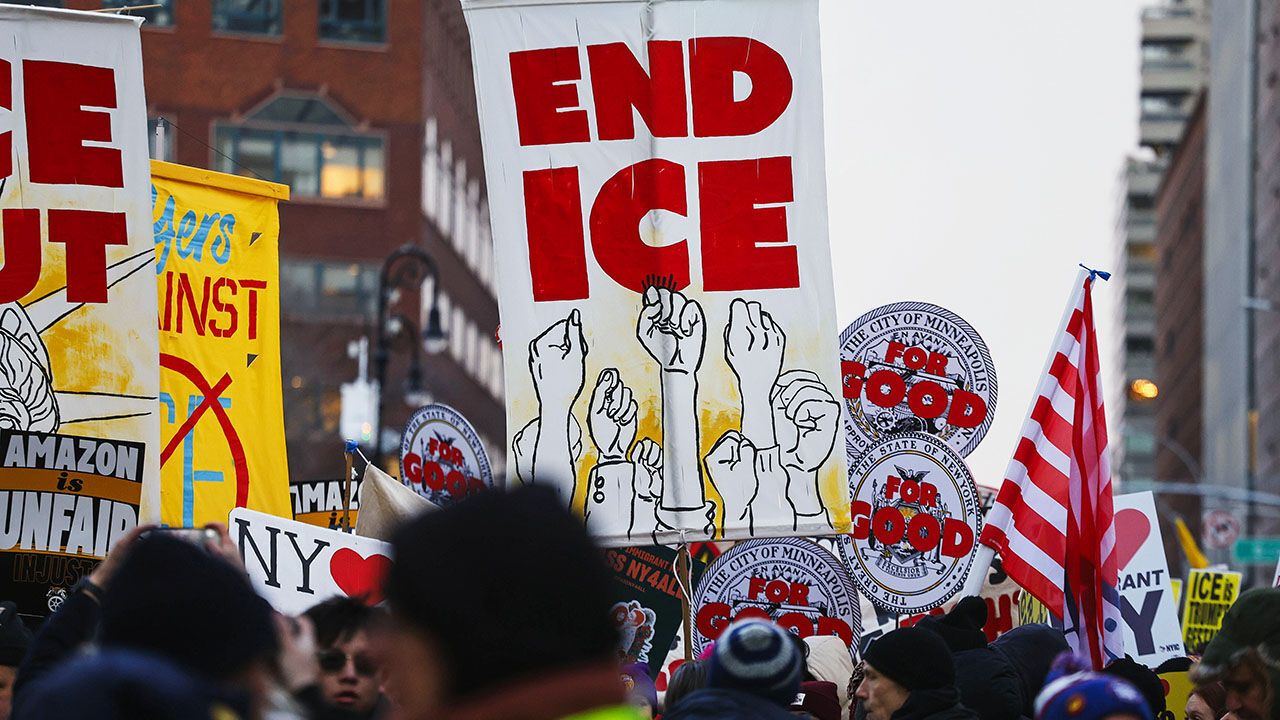 Placards reading 'END ICE' as people participate in a protest in solidarity with Minneapolis and against US President Donald Trump and US Immigration and Customs Enforcement (ICE) in New York City, USA.
