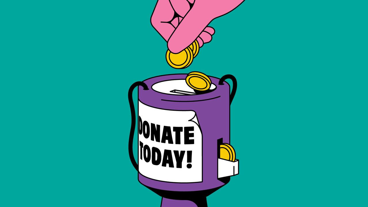 A person is putting coins into a donation can