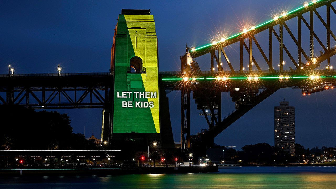 The Sydney Harbour Bridge is illuminated on December 10, 2025 in Various Cities, Australia. Australian landmarks are illuminated on the first day of the national under 16 social media ban coming into effect.