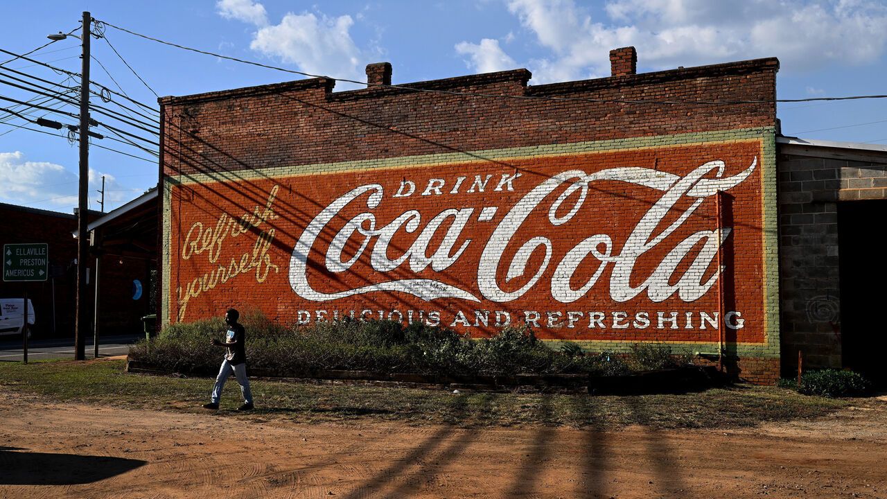 A classic old Coke advertisement is painted on a vintage building in Plains, Georgia.