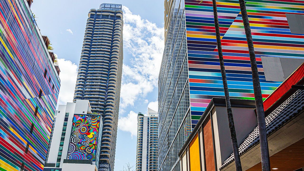 Fabian Burgos mural colorful stripes, Brickell Flatiron Condominiums and SLS Lux Brickell tower in the Brickell Financial District, Miami, Florida.